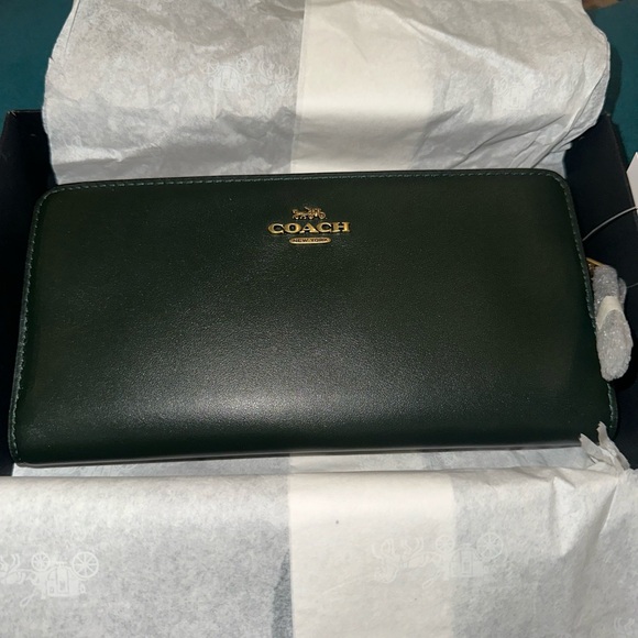 Coach Handbags - Coach New York black wallet with Gift Box. Iconic coach logo.